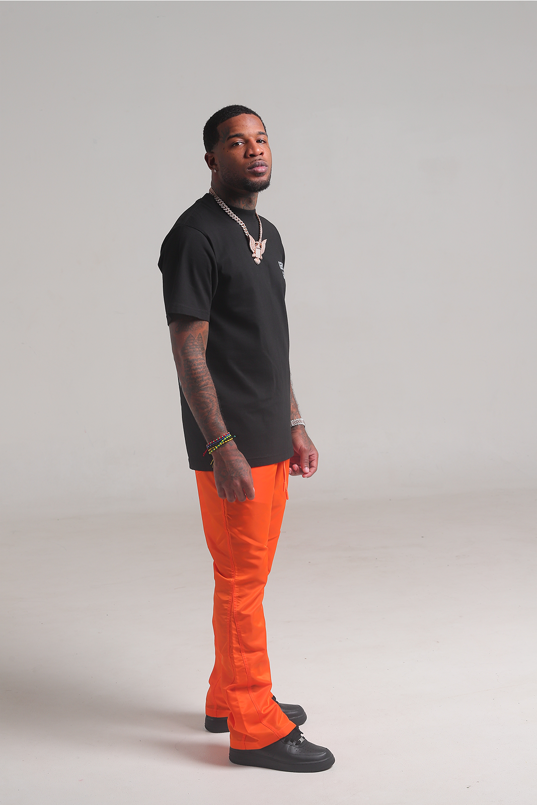 Orange 6 Panel Flared Nylon Pants