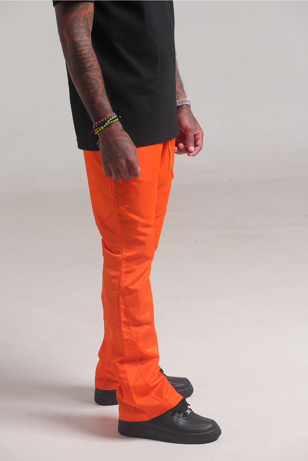 Orange 6 Panel Flared Nylon Pants