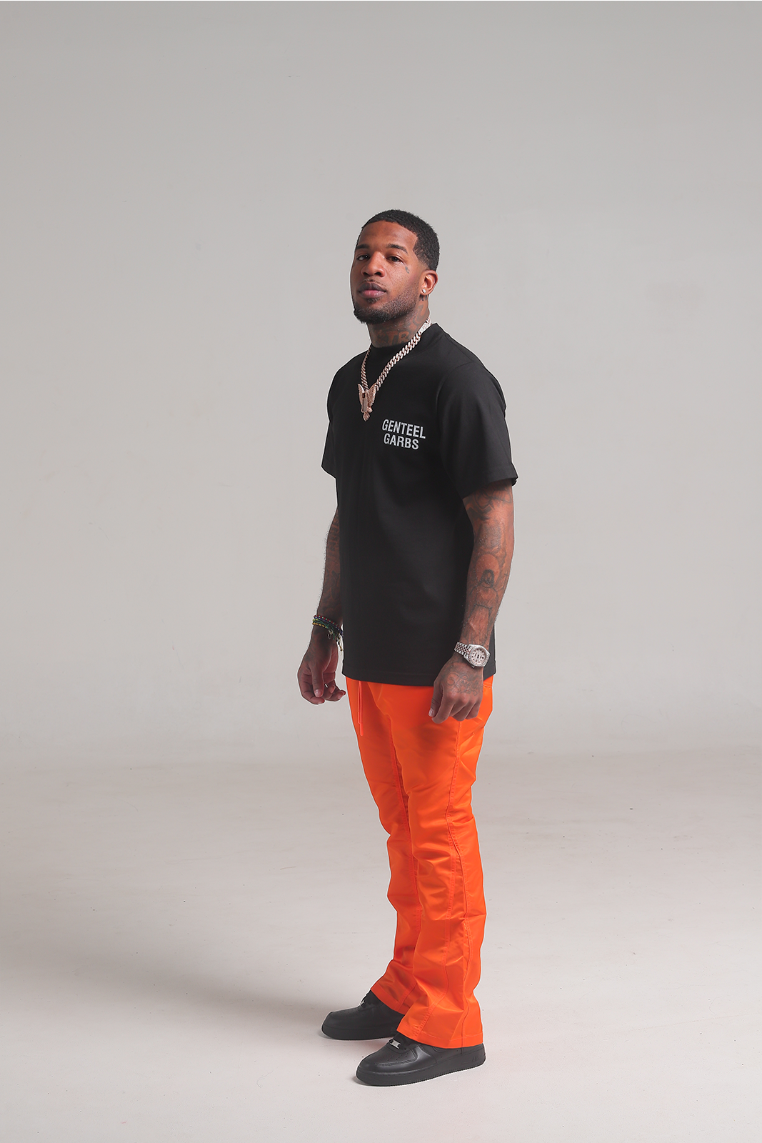 Orange 6 Panel Flared Nylon Pants