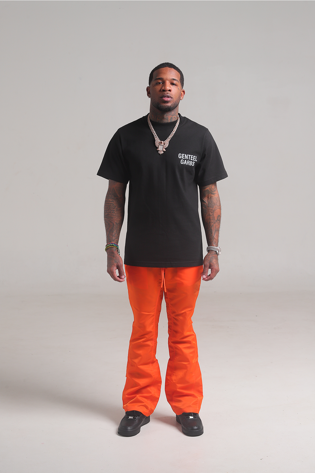 Orange 6 Panel Flared Nylon Pants