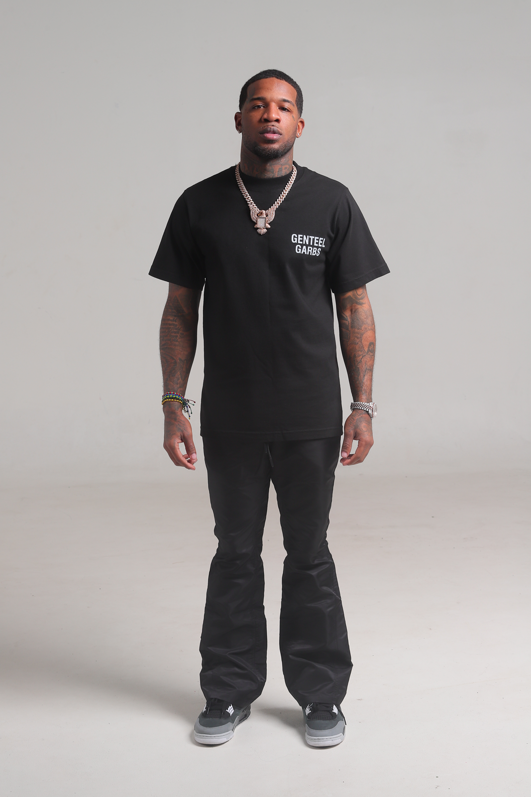 Black 6 Panel Flared Nylon Pants